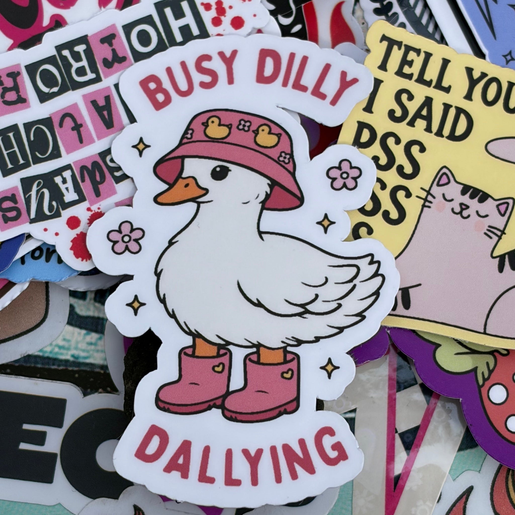 Busy Dilly Dallying, Pink Duck, Single Sticker. Cute hat, wellingtons, boots, meme.