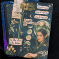 Feyre ACOTAR-inspired Kindle backing insert with celestial moons, a sword, mask, flowers and quotes from the series
