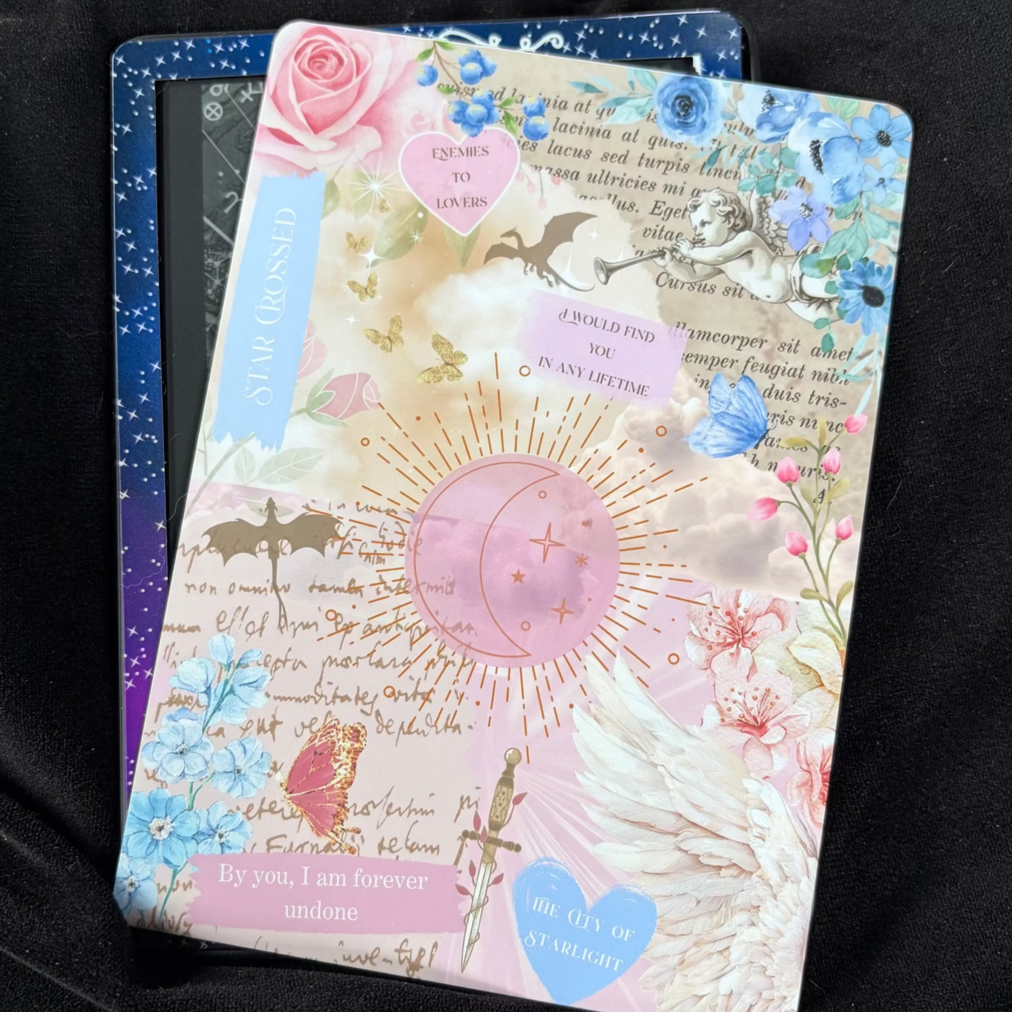 Folk of the Air-inspired Kindle backing insert with pastel flowers, wings, butterflies, book pages and By you I am forever undone quote
