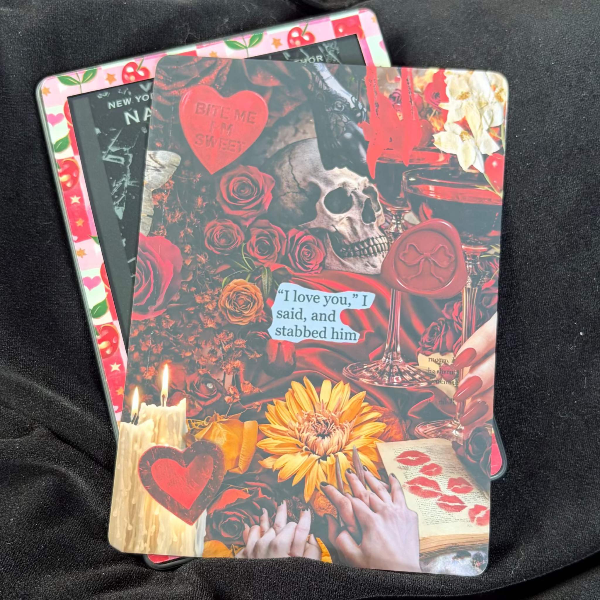 Red and black dark romance Kindle backing insert featuring roses, skull, candles, wax seal, lips and the words I Love You, I Said, and Stabbed Him
