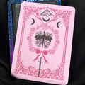 Pink romantasy Kindle backing insert with an ornate floral border, dark dragon, roses, crescent moons, mountains and sword
