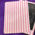 Pink and pale pink striped Kindle backing insert with a shattered-glass holographic finish and rounded corners
