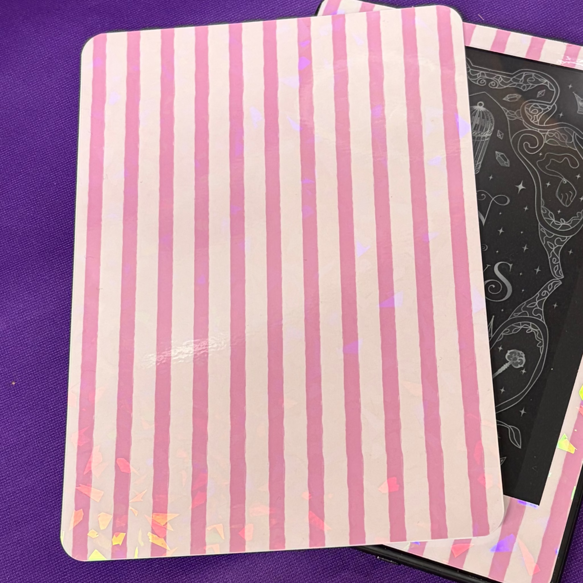 Pink and pale pink striped Kindle backing insert with a shattered-glass holographic finish and rounded corners
