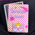 Princess Donut, Kindle Backing Insert. Lit RPG. Dungeon Crawler Carol. Bookish. Cat with crown on checker yellow and pink backround with splatter paint

Made to order. Made to fit your specific model. Matte laminated for durability. Easy to install in a clear case.&nbsp;