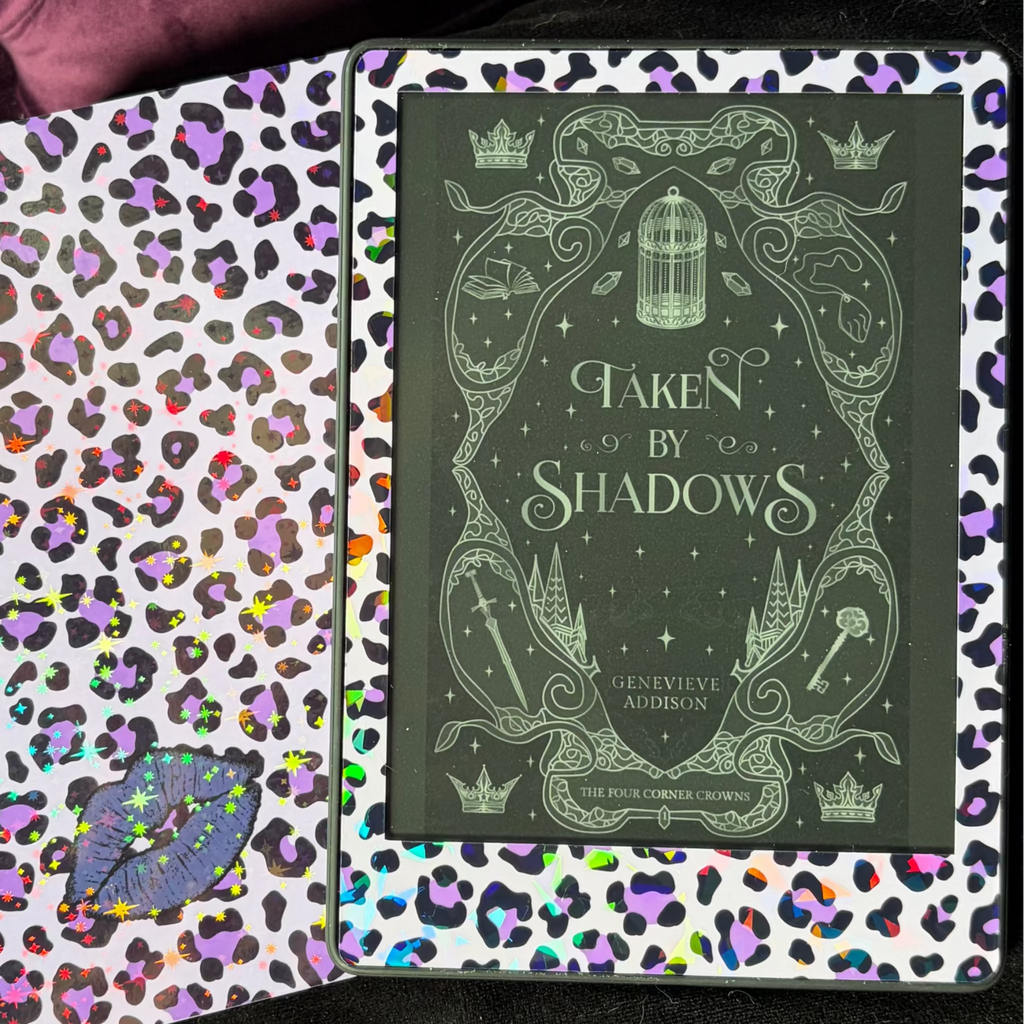 Purple sparkle leopard-print removable vinyl skin applied to the front border of a Kindle
