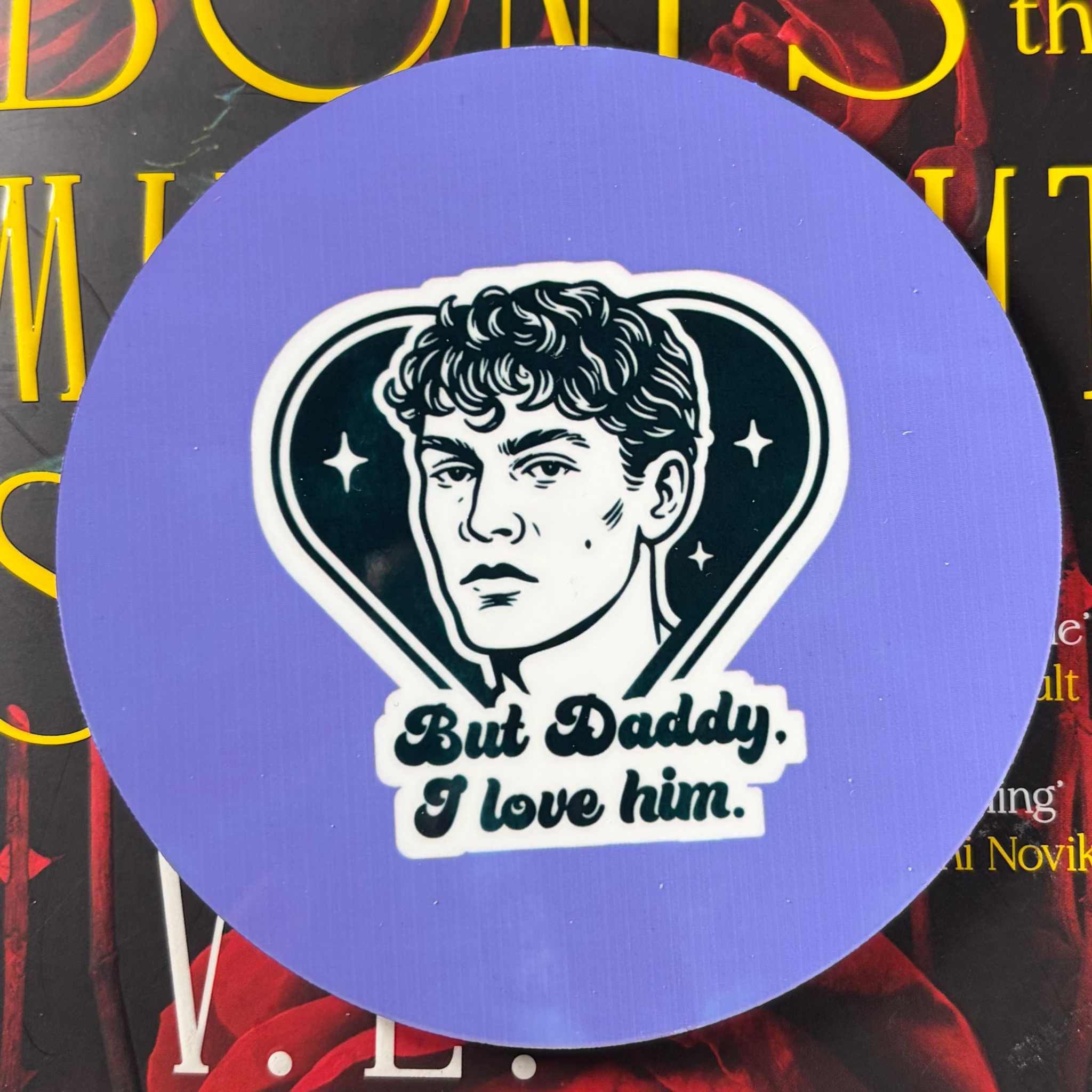 Round purple Heated Rivalry inspired coaster featuring Ilya Rozanov and But Daddy I Love Him lettering
