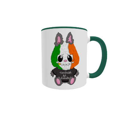 Irish Labubu Mug by Fairly Quare Designs: Labubu in Irish colours with a cúpla focal on an 11oz white ceramic mug with a green handle