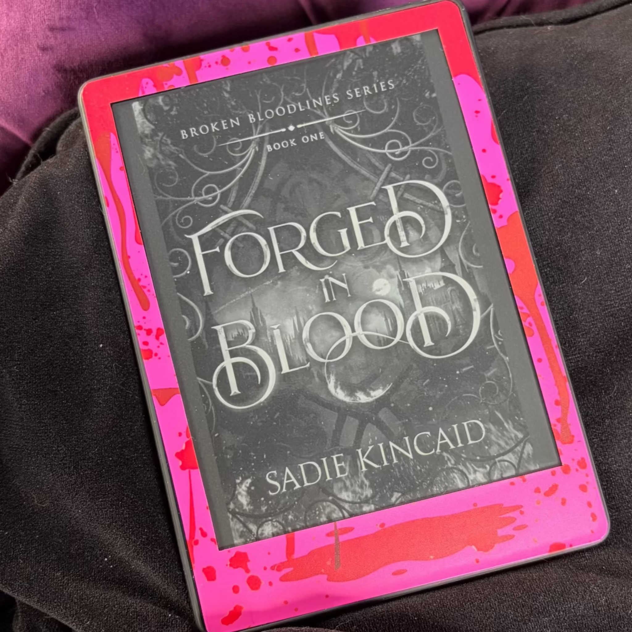 Slasher Queen removable front Kindle skin with a hot-pink and red blood-spatter pattern
