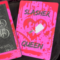 Bright pink and red Slasher Queen Kindle backing insert featuring blood splatters, a dripping heart and a white meat cleaver
