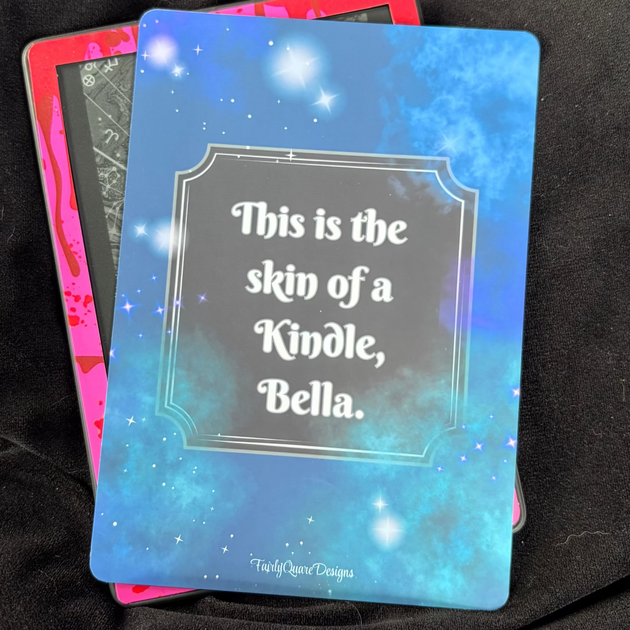 Twilight-inspired Kindle backing insert with the quote This is the skin of a killer Bella on a sparkling blue background
